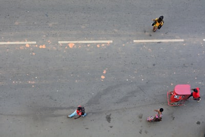 people walking on the street cameroon teams background