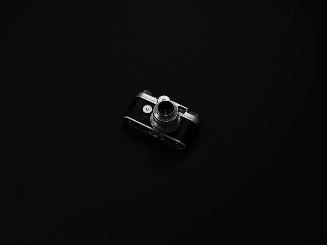 DSLR camera with black background, Photographer’s Camera