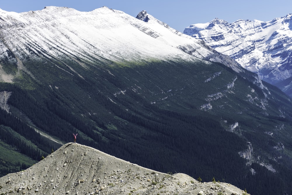 man standing on mountain