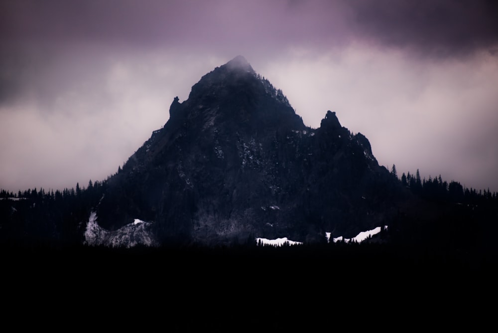 gray mountain at nighttime
