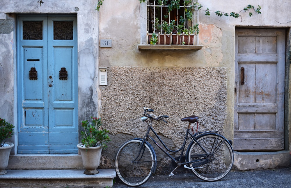 bicycle park beside wall