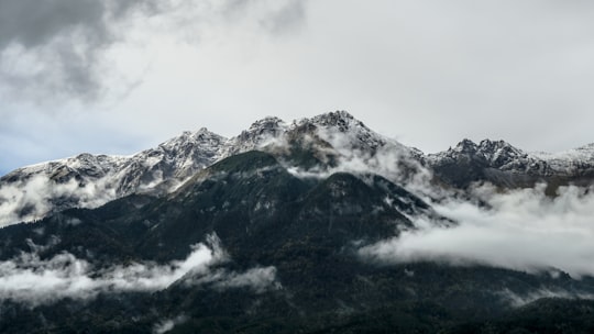 mountain under white cloudy sky in Innsbruck Austria