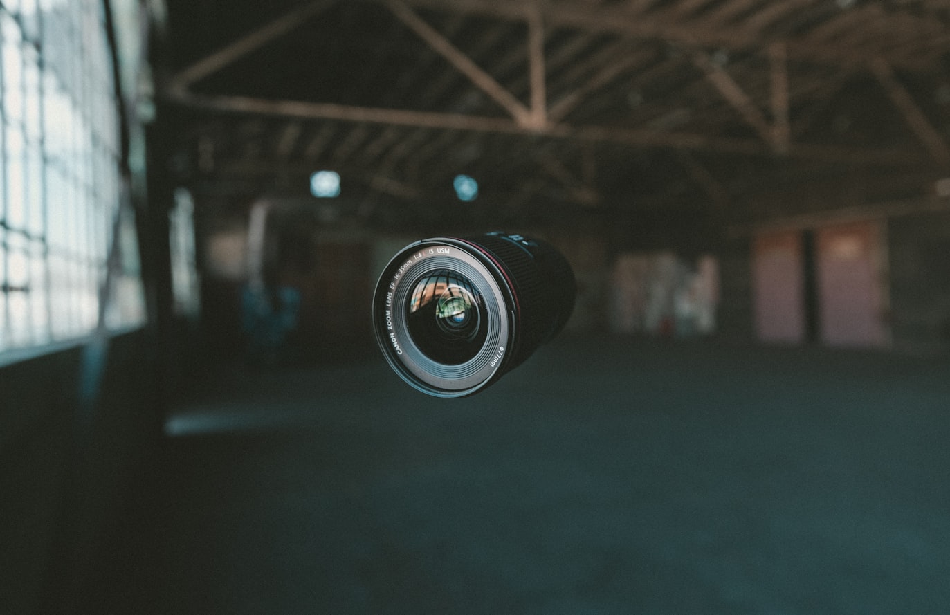 Camera Lens floating in the middle of the room