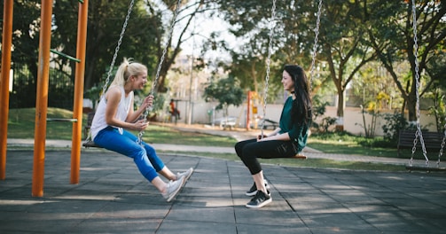 woman sitting on swing