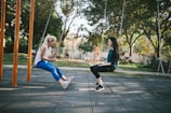 woman sitting on swing
