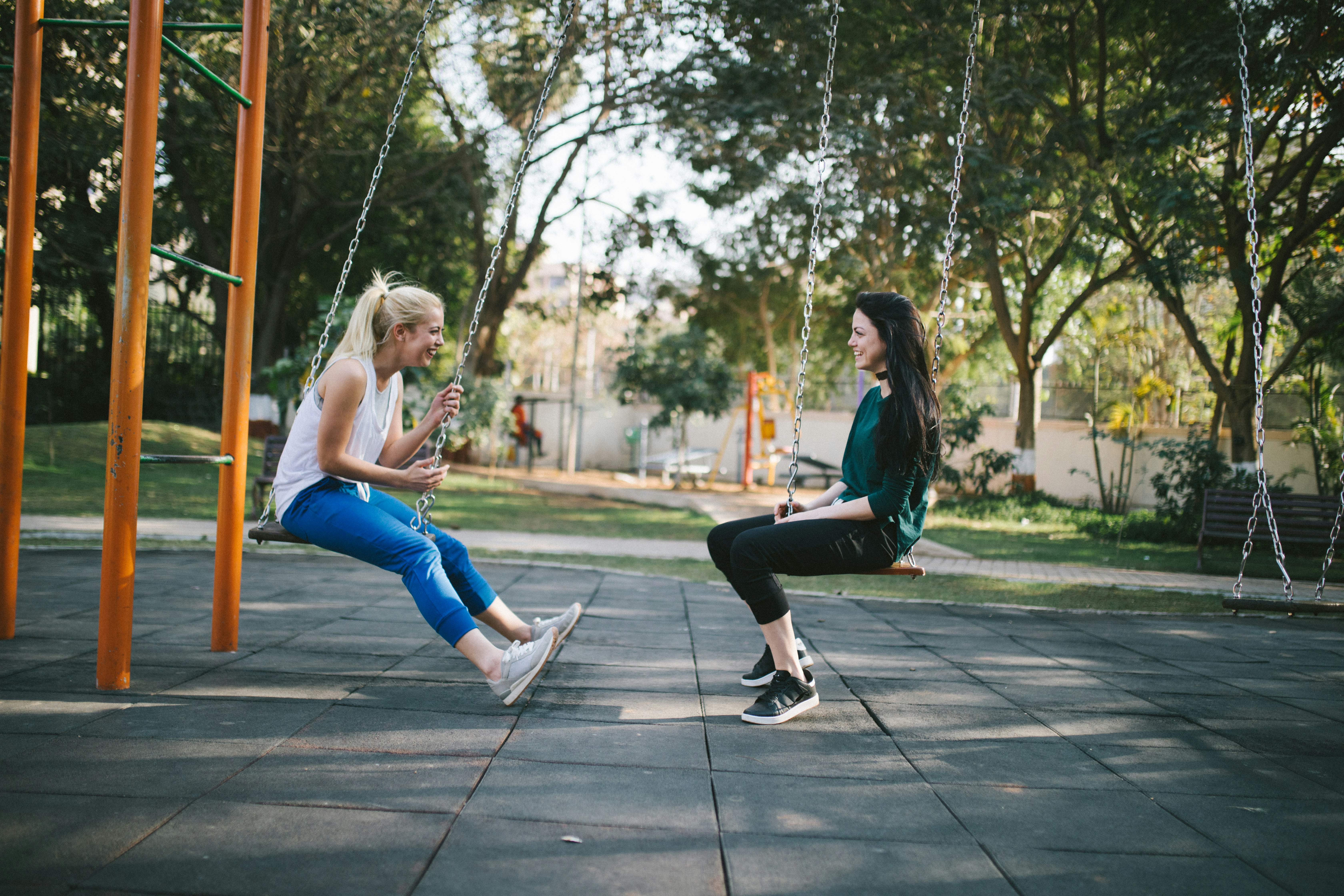 woman sitting on swing