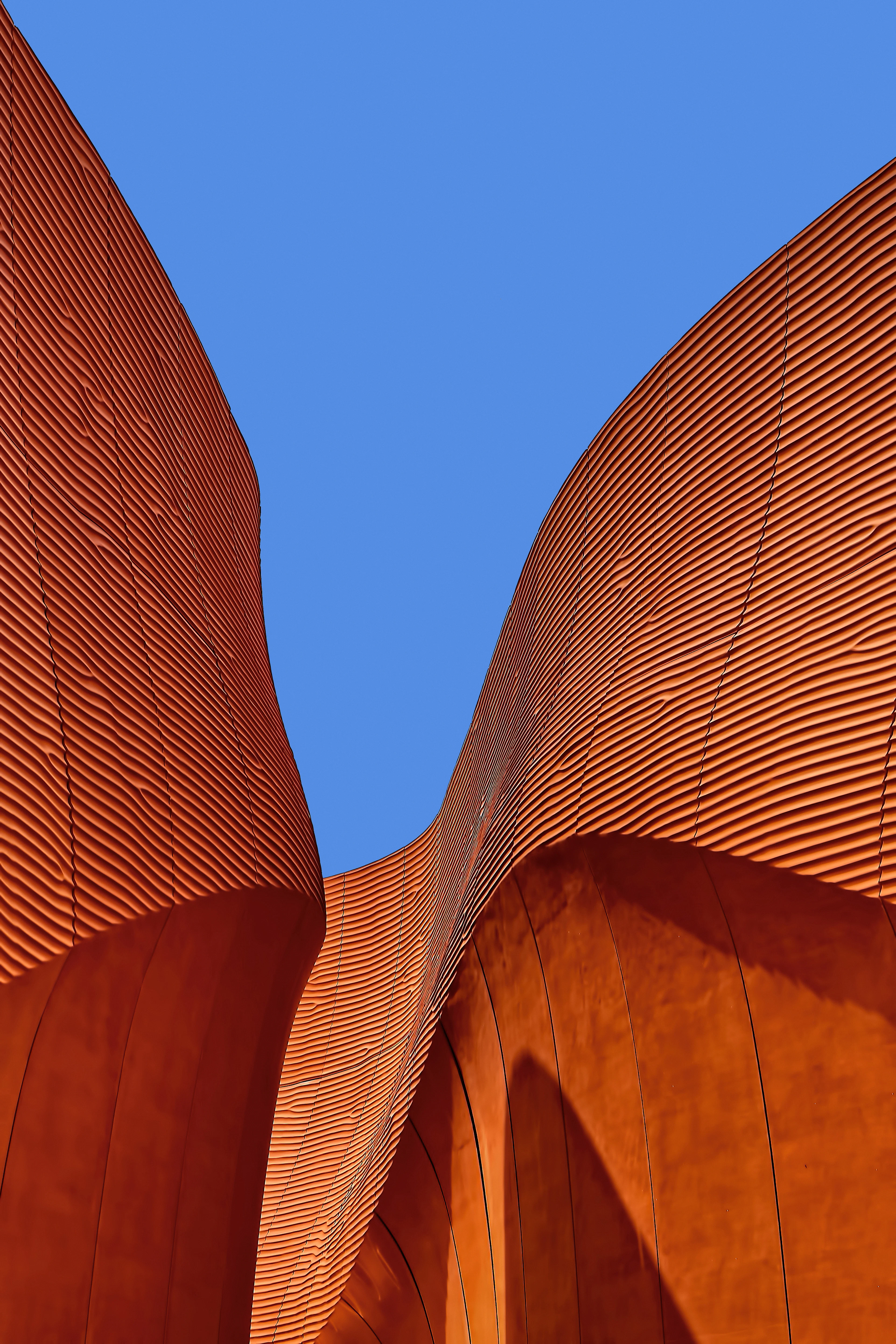 Curved office facade with ribbon glazing