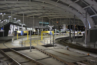 Detailed technical drawings of tram-train stations and tracks.