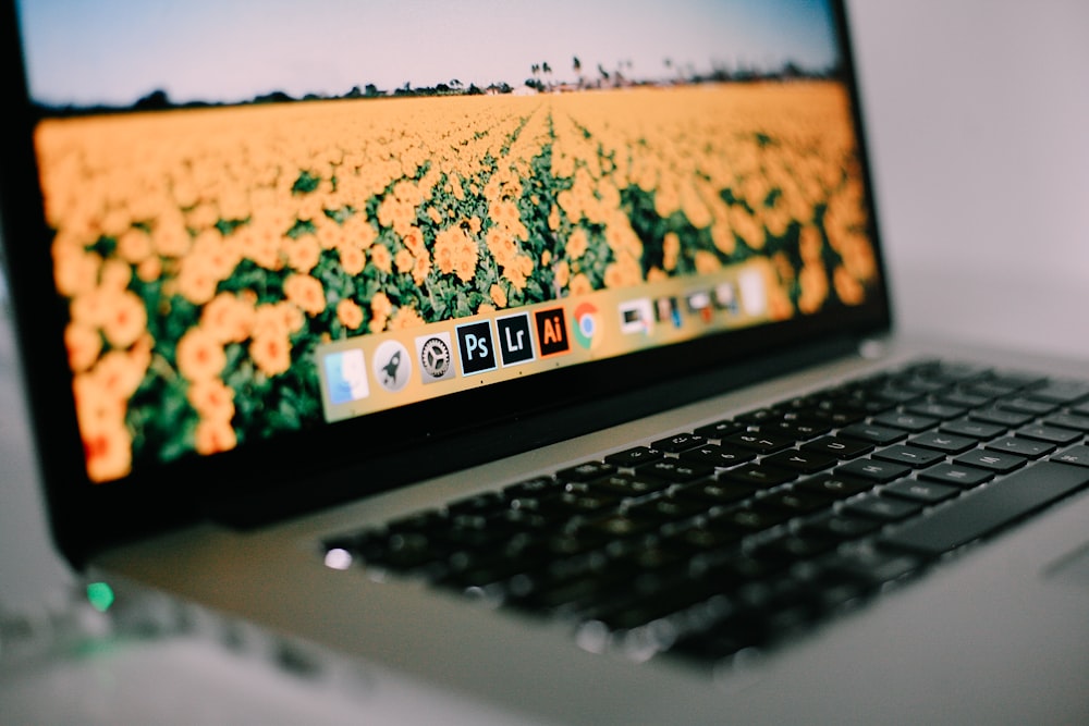 Blurry close-up of a MacBook displaying the desktop