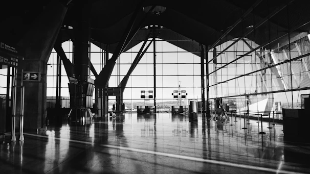 An elegant airport terminal bathed in natural light, symbolizing global connections.
