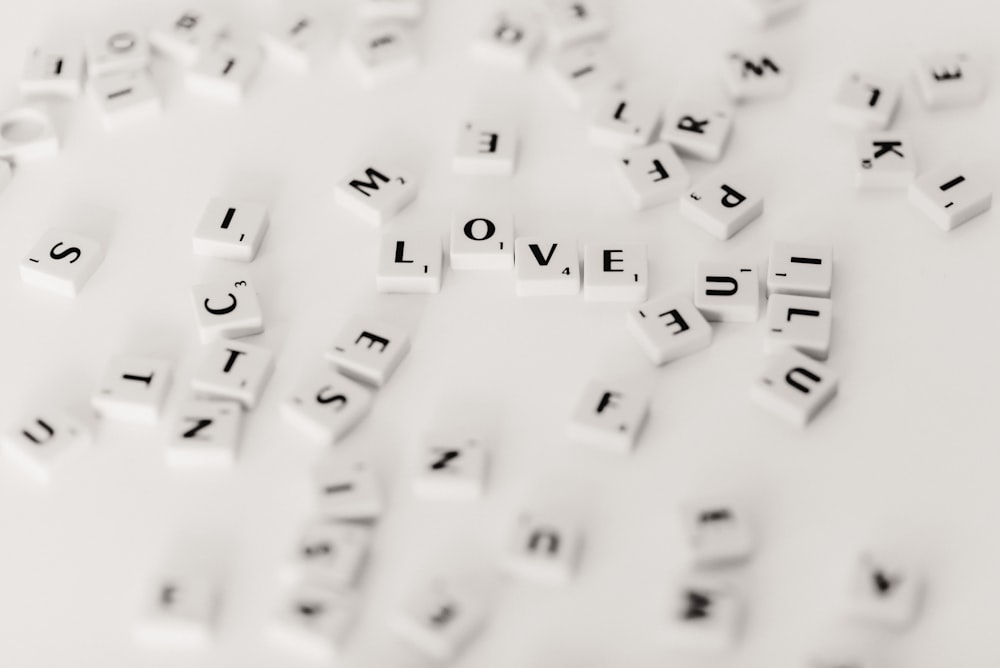 shallow focus photo of scrabble pieces