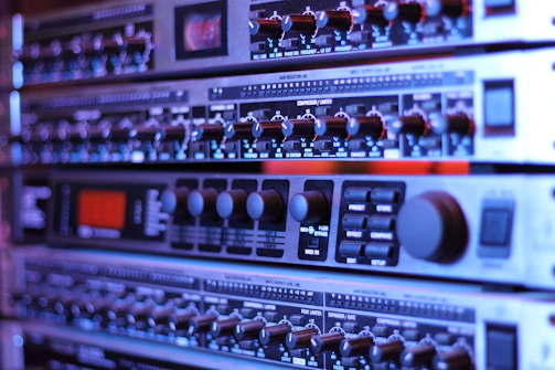 shallow photography of black and silver audio equalizer