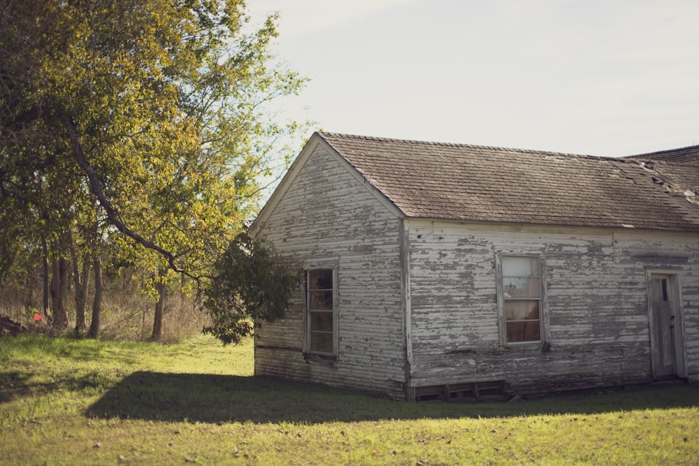 white and brown wooden house during daytime