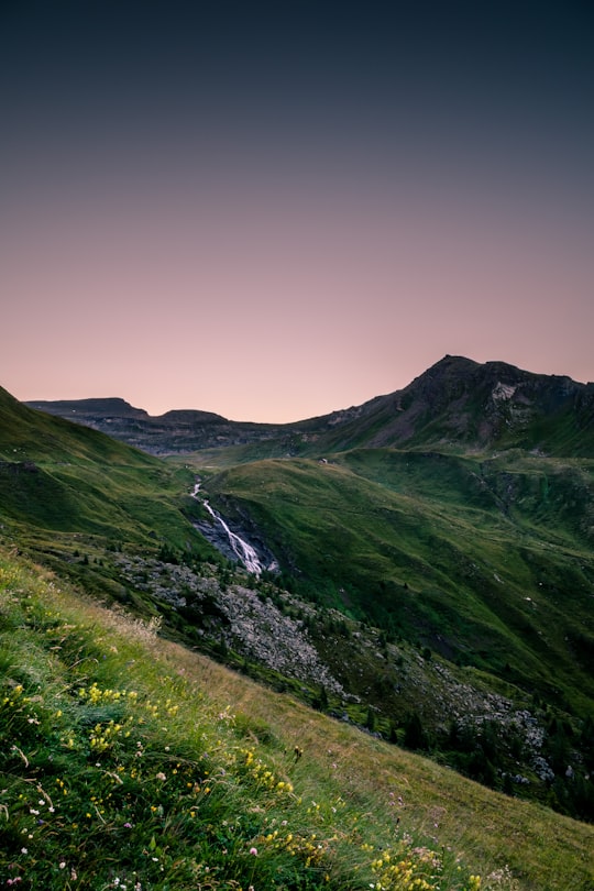 landscape photography of mountain range with river cascading in Grossglockner High Alpine Road Austria