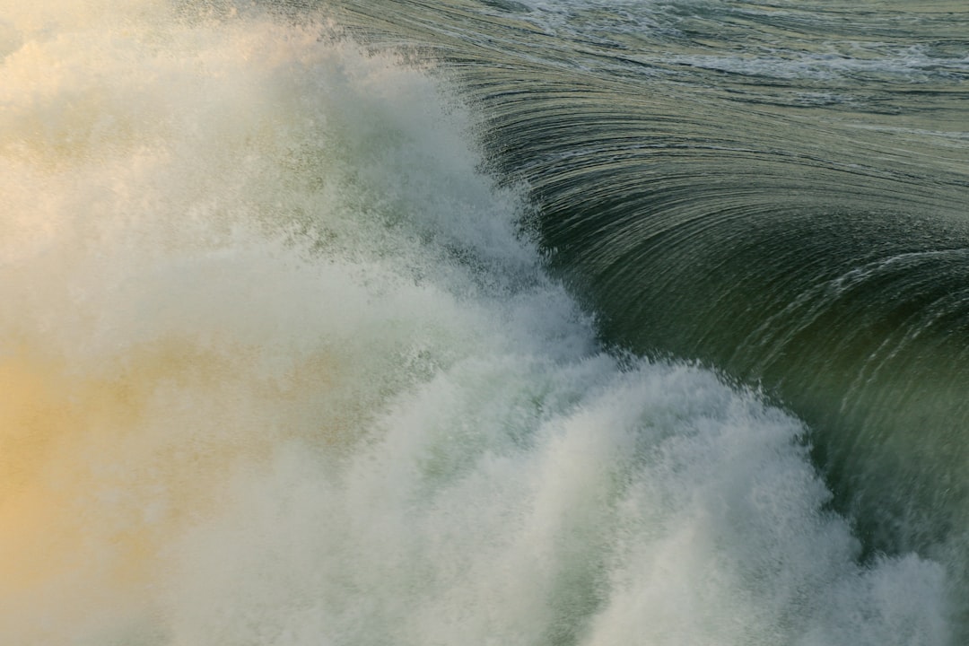 Winter swell in southern california is asking for some dark water and some massive close-outs. Here I shot this from a pier while the swell was stormy and big
