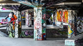 Players biking through a park, marking their territory in the kleym game.