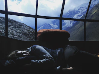 person sleeping near window