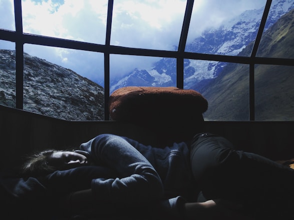 person sleeping near window