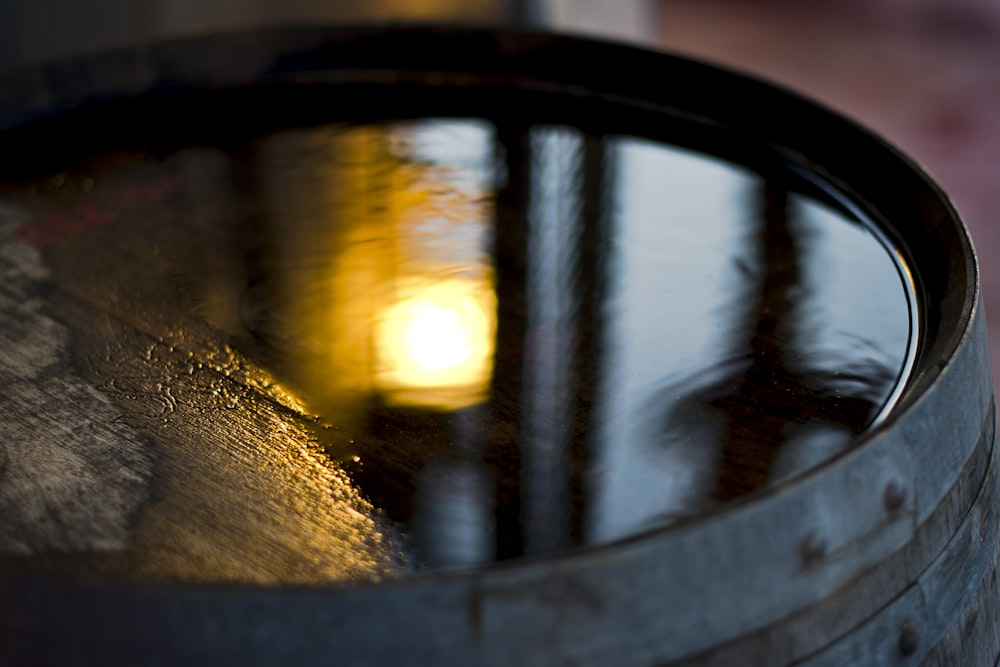 a close up of a barrel with a light in it