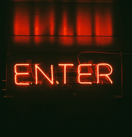 red Enter neon signage