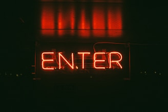 red Enter neon signage