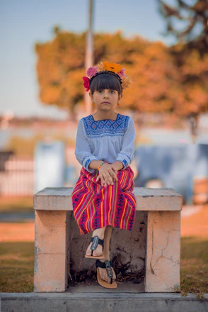 girl sitting on bench