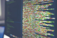 Colorful software or web code on a computer monitor