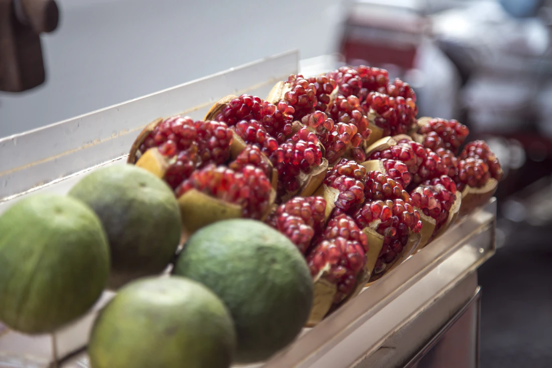 Fresh pomegranates displayed for retail