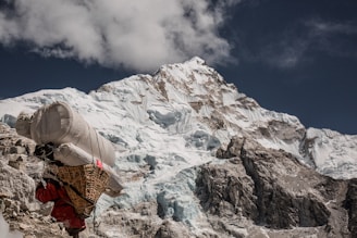 A courier delivering a confidential package against the backdrop of the Andes mountains at sunrise.