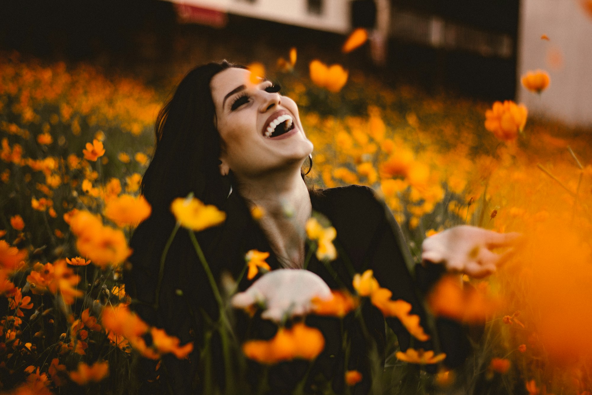 Woman smiling in flower field