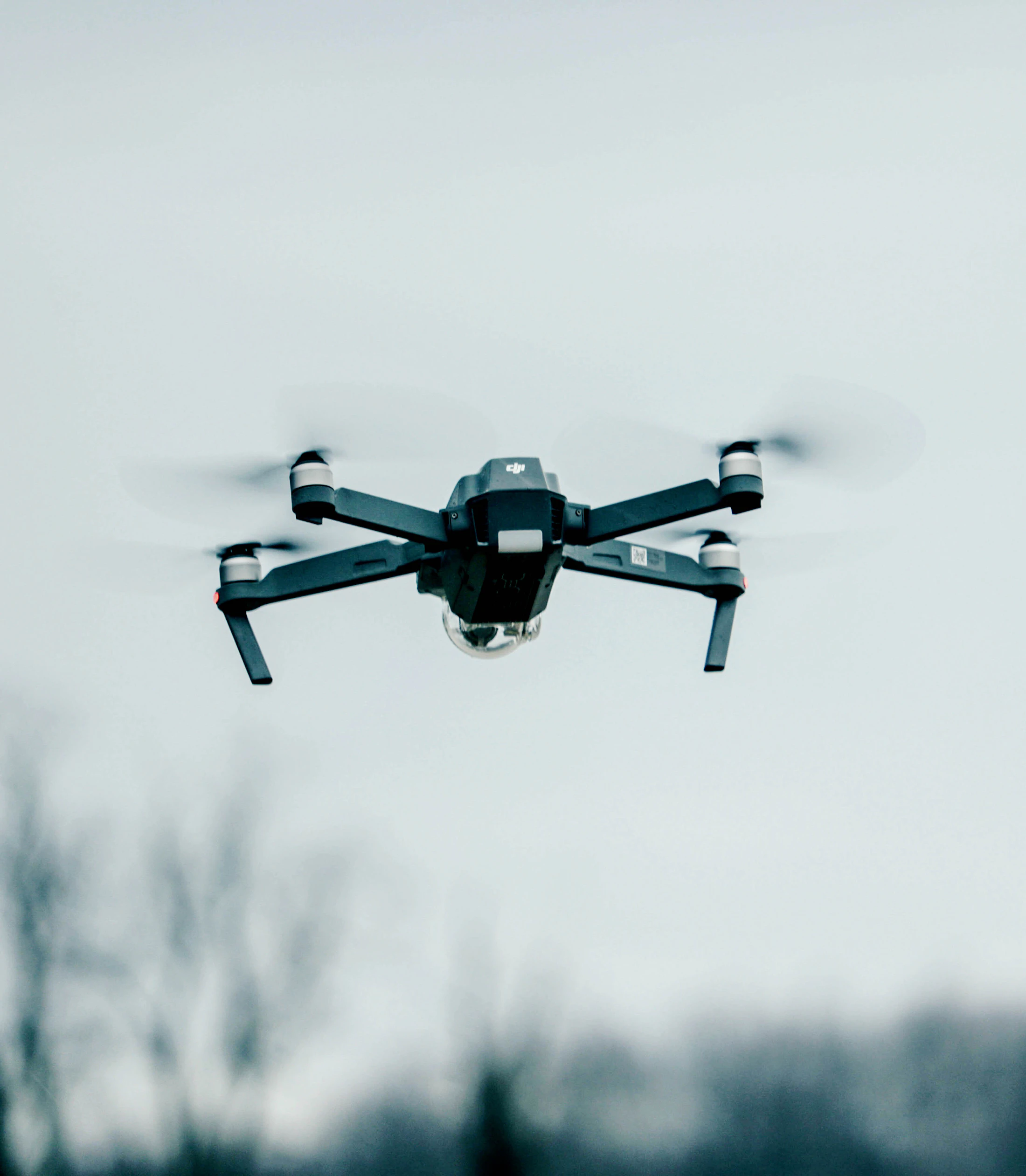 Drone operating above a rugged landscape