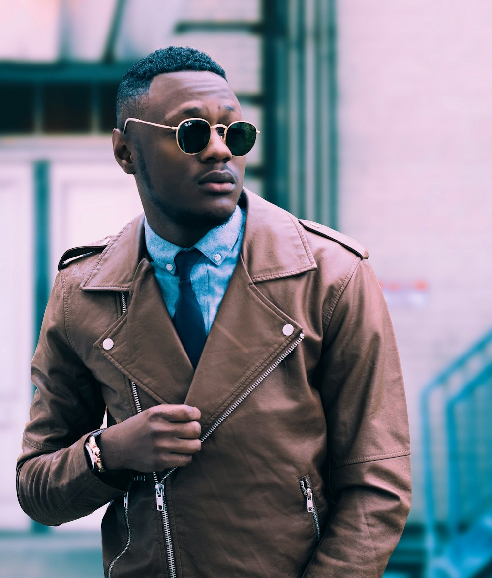 man in brown leather coat