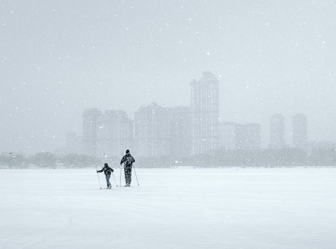 Two skiers.^[[Image](https://unsplash.com/photos/R-iI2W-BC3A) by [Alexey Ruban](https://unsplash.com/@intelligenciya) on [Unsplash](https://unsplash.com/)]
