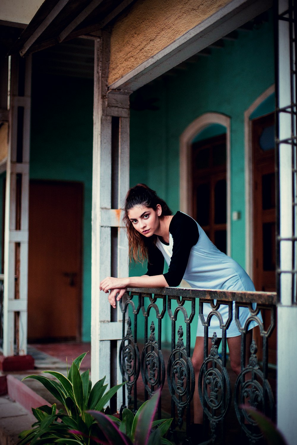 woman in white and black top outside