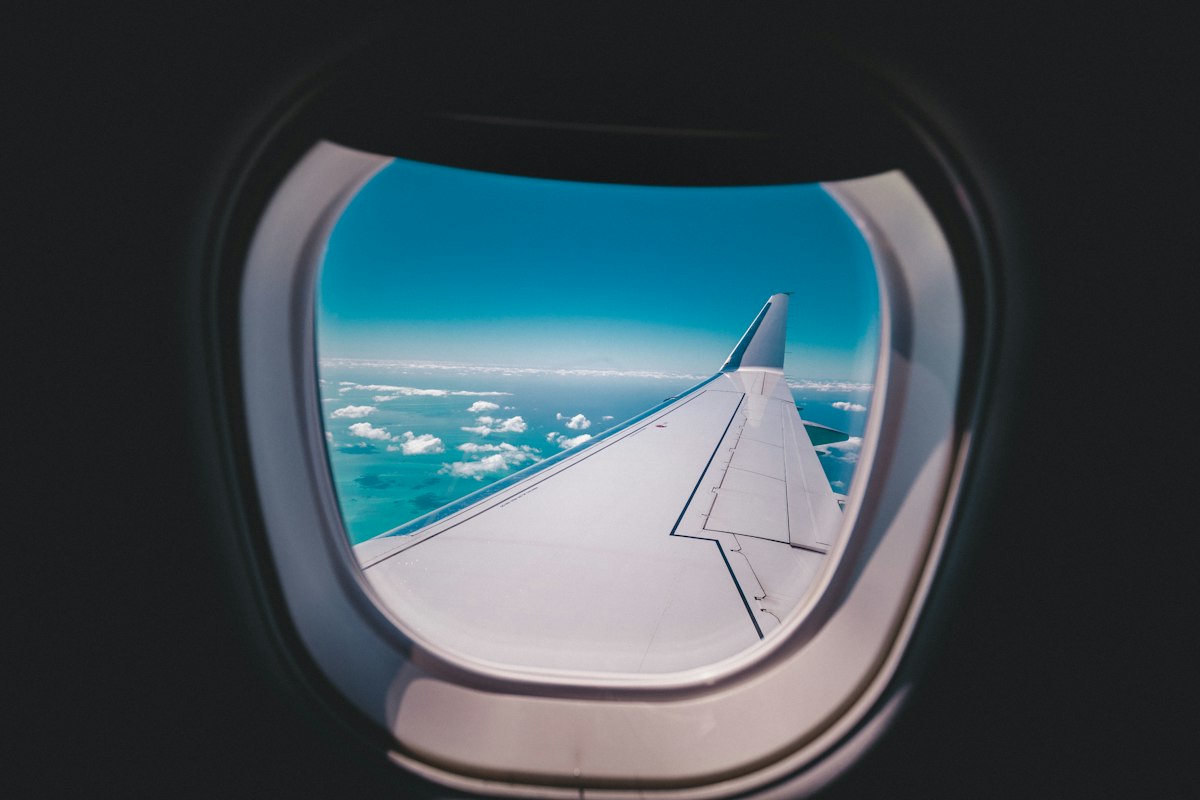 View from an airplane window over the ocean