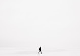 person walking on snowfield