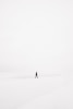 person walking on snowfield