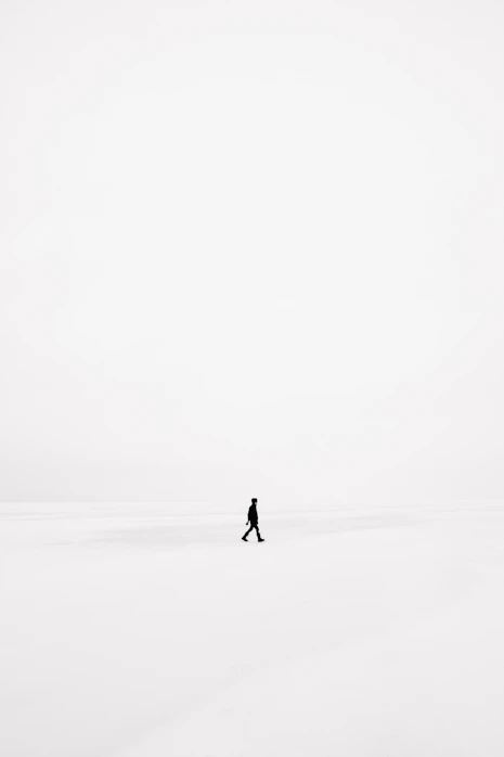 person walking on snowfield