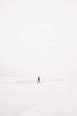 person walking on snowfield