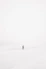 person walking on snowfield