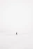 person walking on snowfield