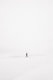 person walking on snowfield