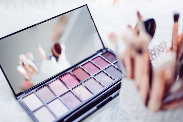 selective focus photography of eyeshadow palette Best Makeup Services at home Chandigarh GracifyMe
