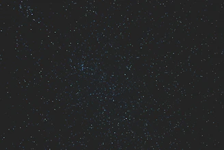 A crisp digital star map with constellations highlighted against a dark navy background.