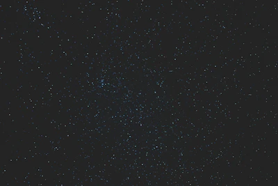 A crisp digital star map with constellations highlighted against a dark navy background.