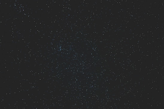 High-resolution dynamic background of a constellation with random sparkling stars.