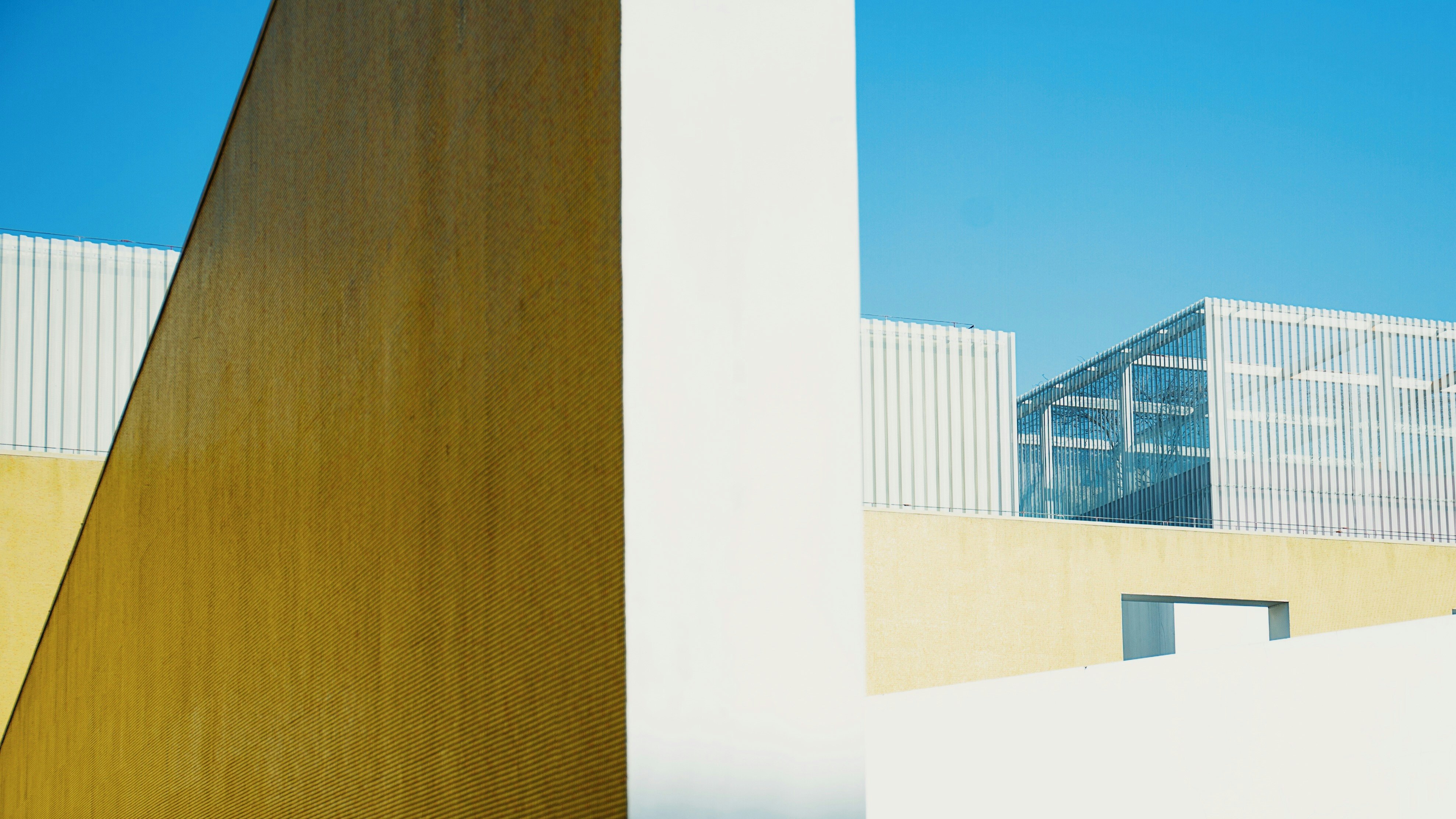 photo of white concrete high-rise building