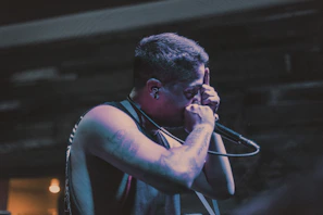 Stephen M. Francis III performing on stage with intense focus and energy.
