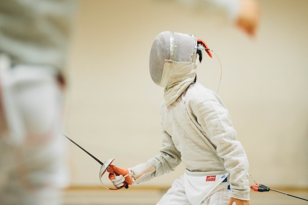 Fencing competition entrant