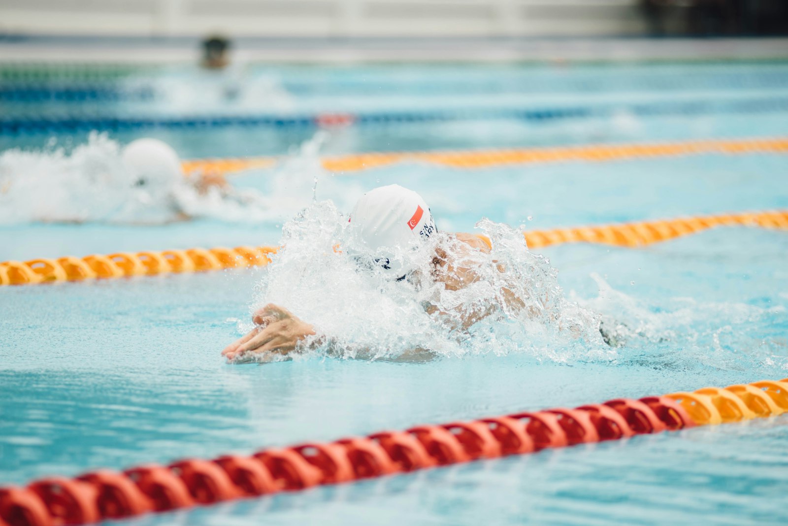 Nikon D750 + Nikon AF Nikkor 180mm F2.8D ED-IF sample photo. Photo of person swimming photography